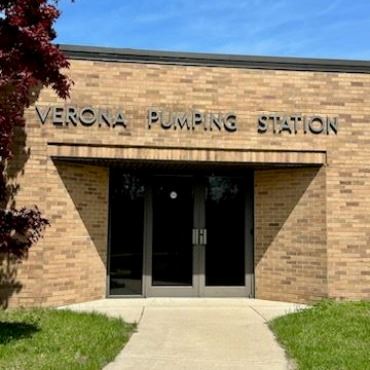 Brick building with Verona Pumping Station above door.