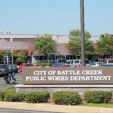 Battle Creek Department of Public Works sign and building.