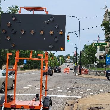 A photo showing the temporary lane shift along Division Street in front of City Hall.