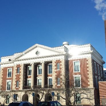Battle Creek City Hall with blue sky background